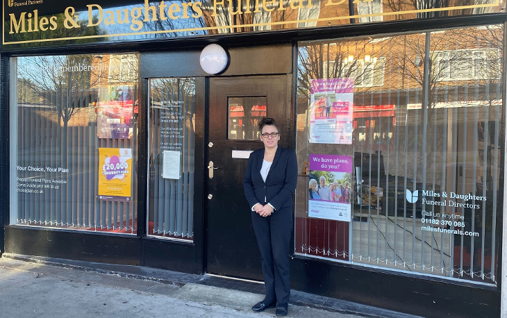 New Funeral Director Catherine Shaw standing in front of branch.