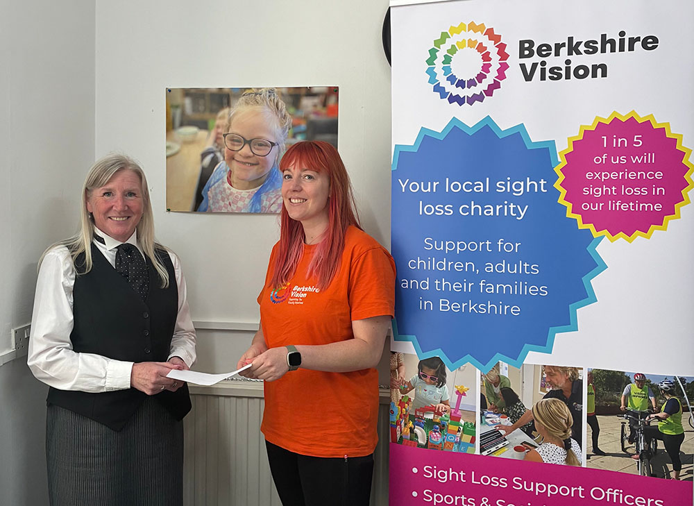 Funeral Director Lisa Parker presenting Berkshire Vision with a grant
